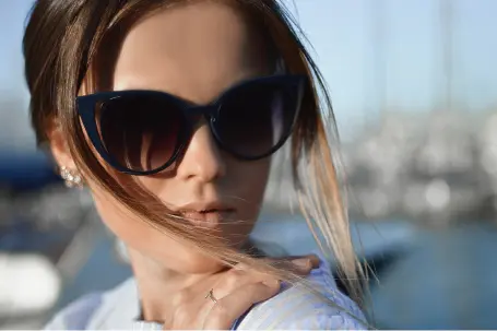  A woman with  black sunglasses