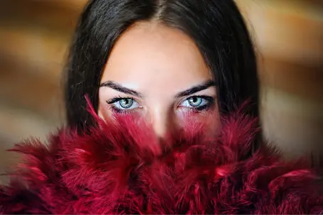 A woman with red boa
